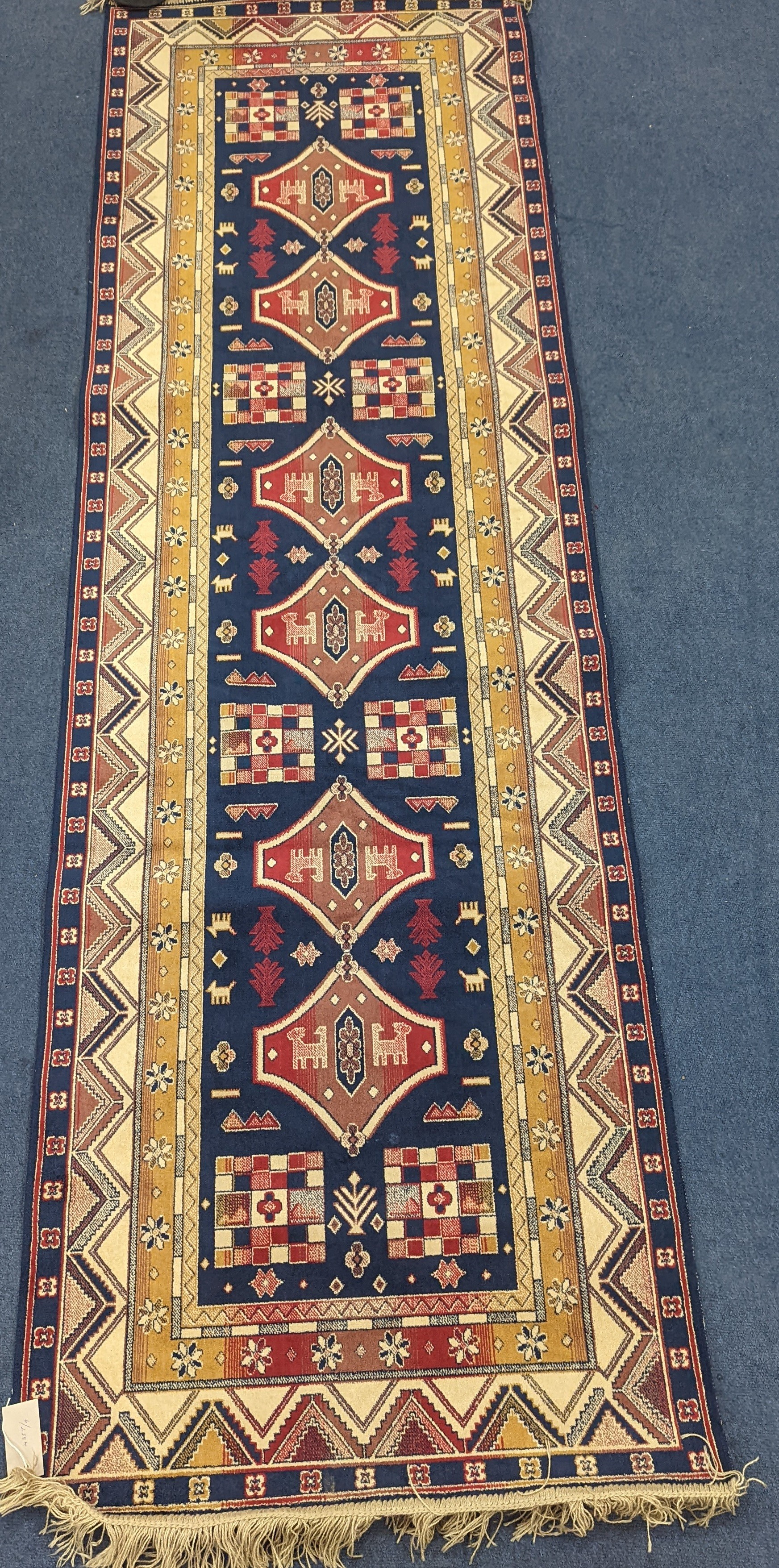 A small Caucasian style runner, 230 x 69cm